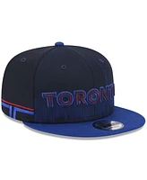 New Era Men's Navy Toronto Blue Jays 2024 City Connect Alternate 9FIFTY Snapback Hat