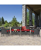 Sugift 4 Pieces Patio Rattan Cushioned Sofa Set with Tempered Glass Coffee Table-Red