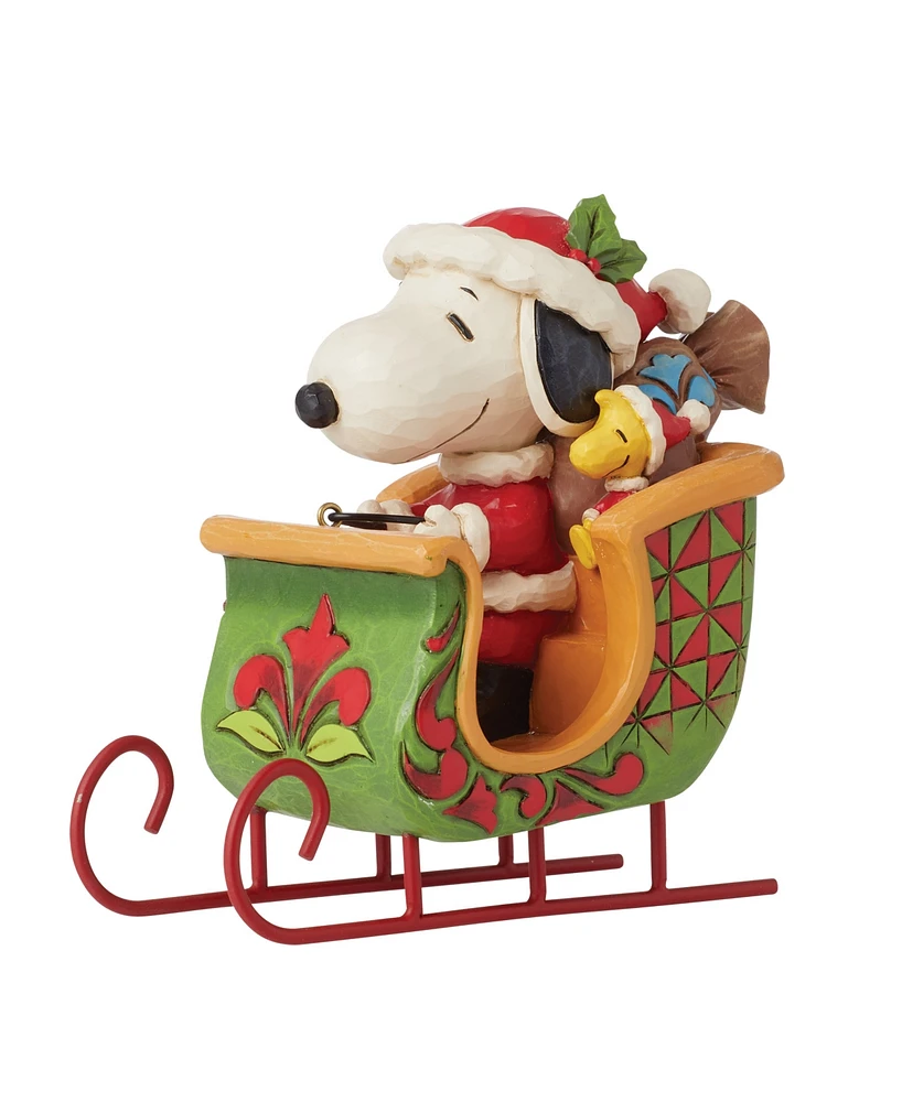 Jim Shore Peanuts Snoopy and Woodstock in Sleigh Figurine