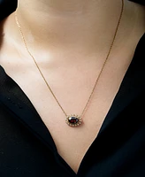 Garnet (1-7/8 ct. t.w.) & White Topaz (1/4 ct. t.w.) Oval Halo 18" Pendant Necklace in 14k Gold-Plated Sterling Silver