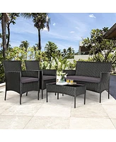 Sugift 4 Pieces Patio Rattan Cushioned Sofa Set with Tempered Glass Coffee Table-Grey & Off White