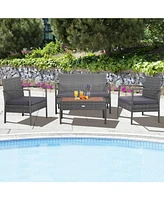 Sugift 4 Pieces Rattan Patio Conversation Furniture Set with Acacia Wood Tabletop