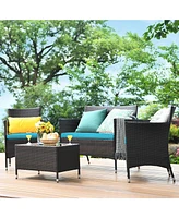 Sugift 4 Pieces Patio Rattan Sofa Set with Chairs and Glass Coffee Table