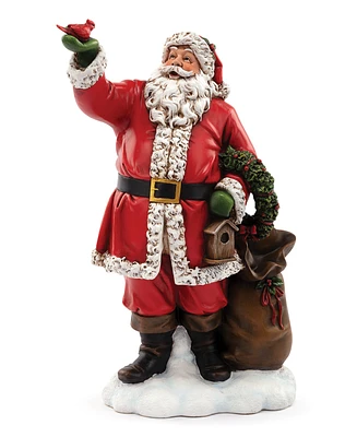 Napco Santa Holding Cardinal Figurine