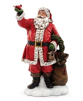 Napco Santa Holding Cardinal Figurine