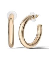 Jessica Simpson Gold-Tone Bold Curved 40 Mm Hoop Earrings - Elegant Statement Hoops