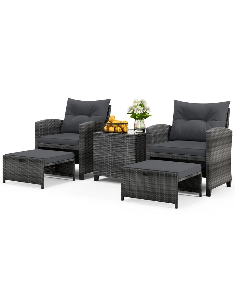 5-Piece Outdoor Rattan Furniture Set with 2 Ottomans and Glass Coffee Table