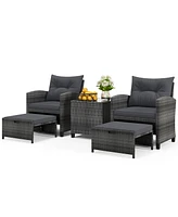5-Piece Outdoor Rattan Furniture Set with 2 Ottomans and Glass Coffee Table