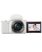 Sony Zv-E10 Mirrorless Camera with 16-50mm Lens, White Bundle with ACCVC1 Vlogger Kit, Memory Card, Backpack, 2 Battery, Charger, Tripod, Strap, Micro