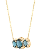 London Blue Topaz (4 ct. t.w.) & Diamond (1/4 ct. t.w.) Oval Trio Halo Pendant Necklace in 10k Gold, 16" + 2" extender