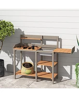 Outdoor potting bench with cabinet