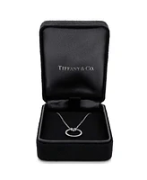 Pre-Owned Tiffany & Co. Small T Circle Pendant Necklace 18K White Gold with Diamonds and Center Baguette Diamond
