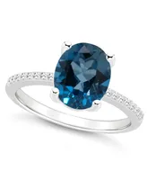 Macy's Women's London Blue Topaz (3-3/5 ct.t.w.) and Diamond (1/10 Ring Sterling Silver