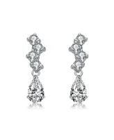 Genevive Sterling Silver with Rhodium Plated Clear Pear and Round Cubic Zirconia ZigZag Drop Earrings