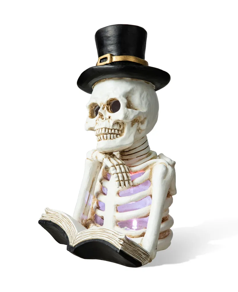 Glitzhome 10.25" H Halloween Lighted Resin Skull Reading Book Table Decor