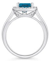 Macy's London Blue Topaz (2-3/4 ct. t.w.) and Diamond (1/4 Halo Ring 14K Gold