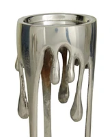 CosmoLiving Aluminum Abstract Pillar Drip Candle Holder with Melting Designed Legs Set of 3 - 12", 10", 8" H