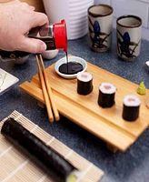 Joyce Chen 3pc Burnished Real Sushi Board Set. 3pc set includes a real sushi board, ceramic soy sauce dish, pair of chopsticks.