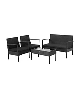 Vebreda 4 Pieces Patio Rattan Furniture Set with Cushion