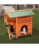 Slickblue 2-Story Wooden Feral Cat House – Outdoor/Indoor Kitty Shelter with Door, Stairs, and Weatherproof Roof, Orange & Green