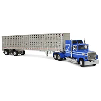 First Gear 1/64 Blue Ford Ltl 9000 60in Aerodyne Sleeper & Wilson Livestock Trailer