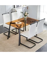 Streamdale Furniture Table and chair set. Large modern rectangular table with brown glass top and black metal legs. It is equipped with soft and comfo