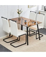 Simplie Fun Table and chair set. Large modern rectangular table with brown glass top and black metal legs. It is equipped with soft and comfortable Pu