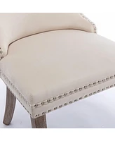 Streamdale Furniture 2 Beige Wingback Dining Chairs with Nailhead Trim & Wood Legs