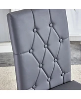 4 piece set of gray armless dining chairs brings a touch of elegance and mystery to the dining area with its deep gray tone, The grid and buckle desig