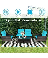 Sugift 4 Pieces Outdoor Rattan Wicker Loveseat Furniture Set with Cushions-Turquoise
