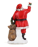 Napco Santa Holding Cardinal Figurine