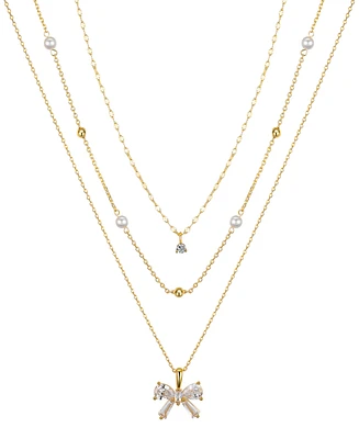 Unwritten Cubic Zircoina and Mother of Pearl Bow Layered Pendant Necklace Set