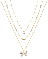 Unwritten Cubic Zirconia and Mother of Pearl Bow Layered Pendant Necklace Set