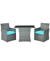 Gouun 3-Piece Patio Rattan Furniture Set with Cushioned Chairs and Glass Table