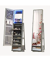 Vlsrka Jewelry freestanding storage mirror cabinet with storage shelves, built-in lights, and rotating feature.