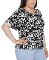 Belldini Plus Grommet Detail Floral Short Sleeve Knit Top