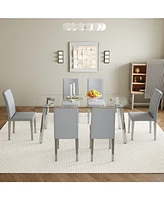 Glass Top Dining Set: Table & 6 Gray Pu Chairs