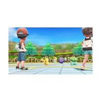 Nintendo Switch White Oled Console with Pokemon Let's Go, Pikachu!, Surge Accessory Gaming Kit, MightySkins Console and Controller Skin Voucher