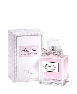 Complimentary Miss Dior Eau de Parfum mini with any $135 purchase from the Dior Women's Fragrance and Bath and Body collection.