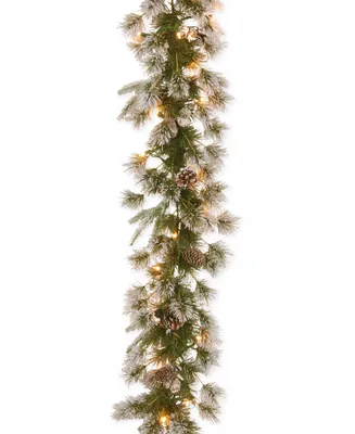 National Tree Company 9' Feel Real Liberty Pine Garland With Pine Cones, Snow & 50 Clear Lights