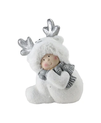 Northlight 12.5" Smiling Child in White Reindeer Snow Suit Christmas Tabletop Decoration