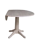 International Concepts 42" Round Dual Drop Leaf Pedestal Table