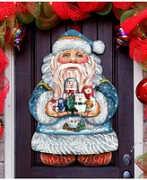 Designocracy Matreshkas Santa Christmas Door Hanger