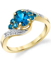 Blue Topaz (1-1/3 ct. t.w.) & Diamond (1/20 ct. t.w.) Swirl Ring in 10k Gold