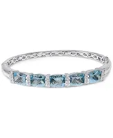 Blue Topaz (14 ct. t.w.) & Diamond (1/8 ct. t.w.) Bangle Bracelet in Sterling Silver