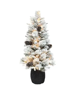 4.5' Pre-lit Flocked Potted Tree with Clear Incandescent Lights and Plastic Rattan-look Base