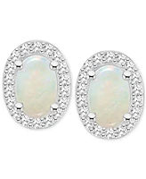 Aquamarine (3/4 ct. t.w.) & Diamond (1/6 ct. t.w.) Oval Halo Stud Earrings in Sterling Silver (Also in Opal)