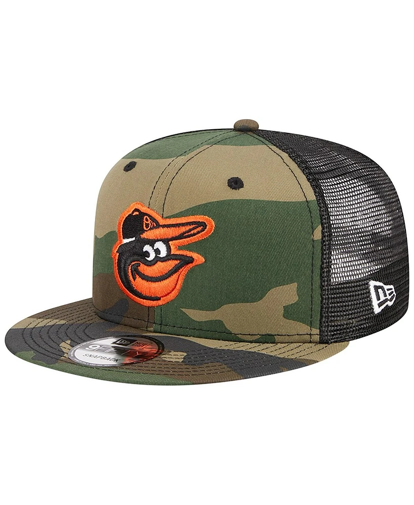 Men's New Era Camo Baltimore Orioles Woodland Camo Trucker 9FIFTY Snapback Hat