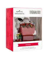 Hallmark Christmas Ornament Peanuts Snoopy on Holiday Doghouse - Multi