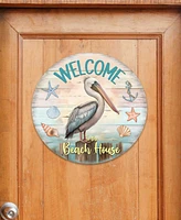 Designocracy Holiday Wooden Door Decor Welcome Sign Pelican Welcome Sign G. DeBrekht